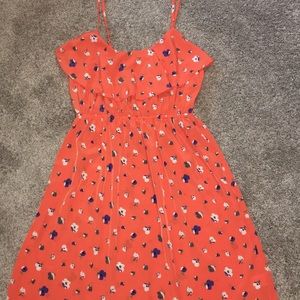 Orange dress with blue flowers and top ruffle